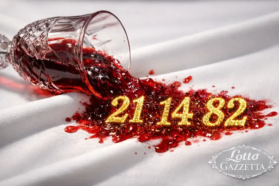 Sognare una Festa Goliardica: Interpretazione e Numeri 6 Sognare una festa goliardica: dettaglio vino rosso versato che forma numeri vincenti del lotto.